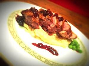 Duck breast with cherry and red wine sauce and potato-parsnip mash