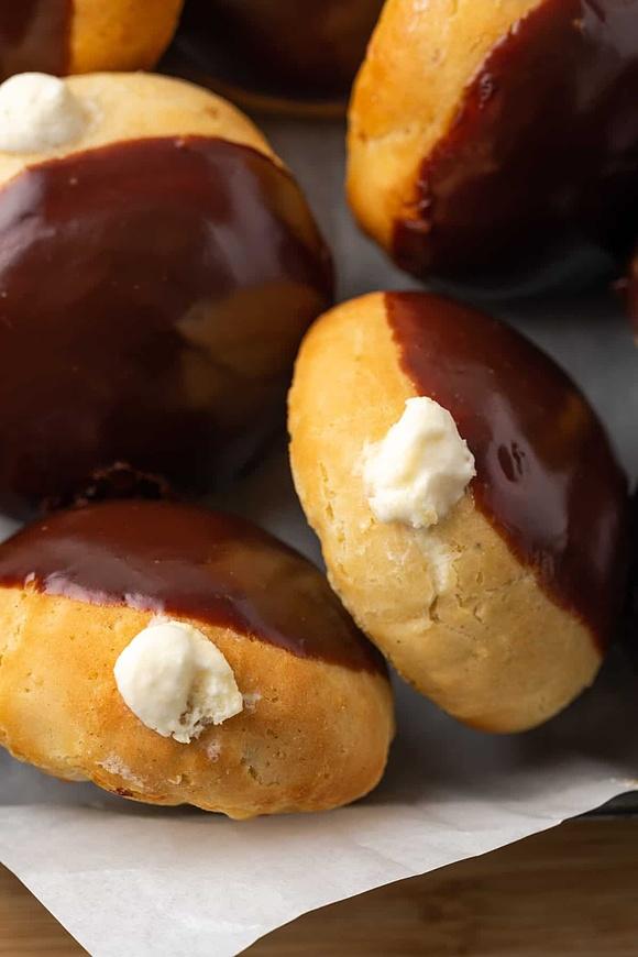 Gluten-free bismark donuts with pastry cream and chocolate glaze