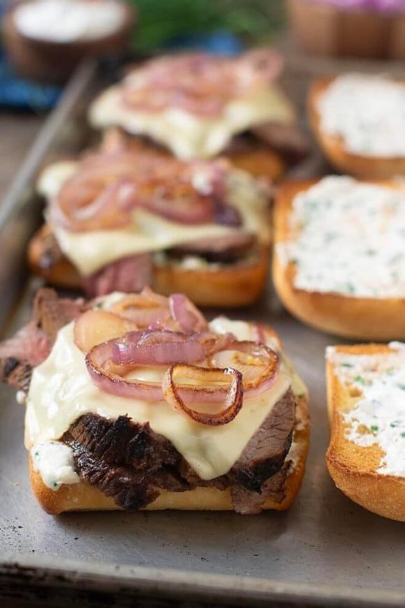 Tri-tip sandwich with caramelized onions and horseradish sauce