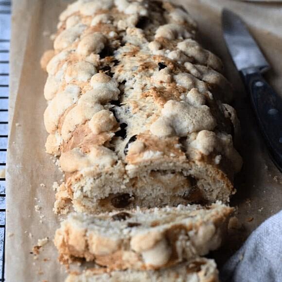 Fluffy vegan lemon loaf with streusel and rum-soaked raisins