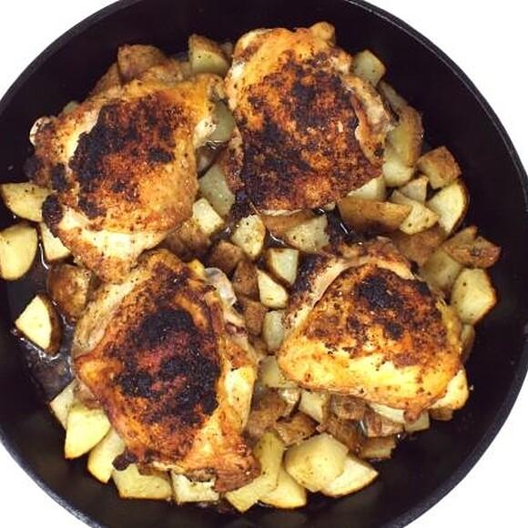 Cast iron roasted chicken thighs with potatoes