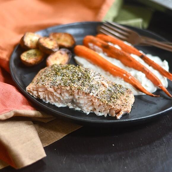 Mediterranean tray-bake salmon with roasted vegetables and celery root purée