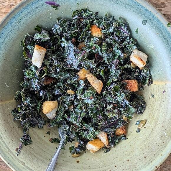 Kale caesar salad with garlicky lemon tahini dressing