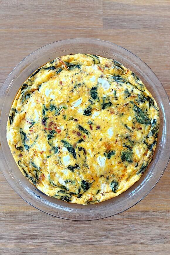 Crustless marry me quiche with spinach, sun-dried tomatoes and goat cheese