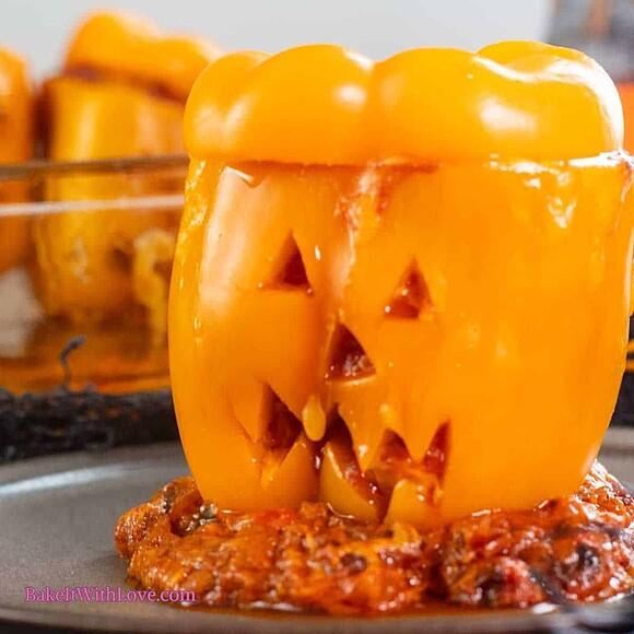 Jack-o'-lantern stuffed peppers