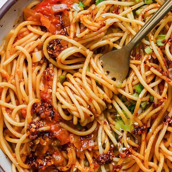 Chili crunch pasta with smashed tomato sauce