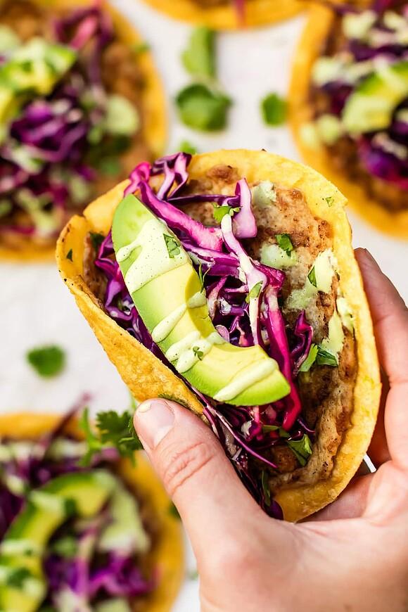 Crispy chicken smash tacos with lime-cabbage slaw and jalapeño sauce