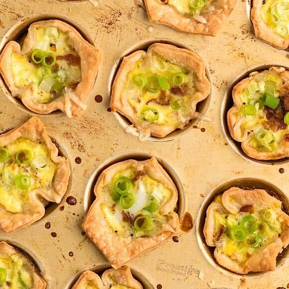 Mini quiche lorraine with bacon and swiss cheese