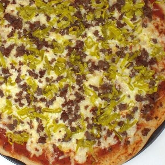 Homemade Italian sausage and pepperoncini pizza