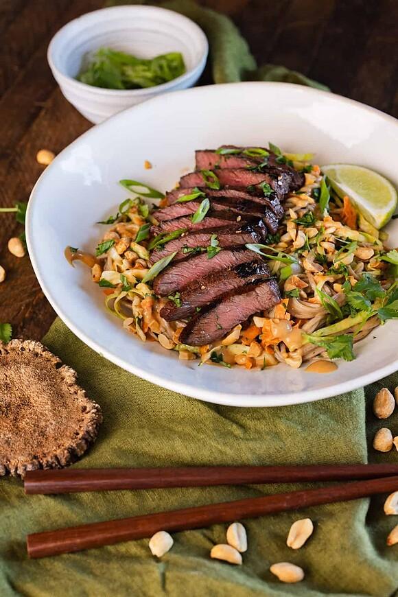 Elk steak noodle bowls with peanut sauce