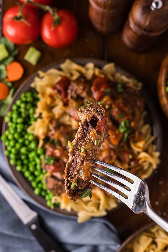 Swiss steak braised in rich tomato gravy
