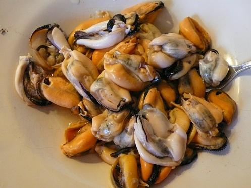 Tiella barese with mussels, rice and potatoes