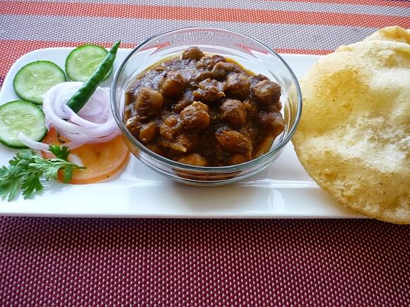 Chole bhature recipe punjabi dish with chickpeas and fried bread