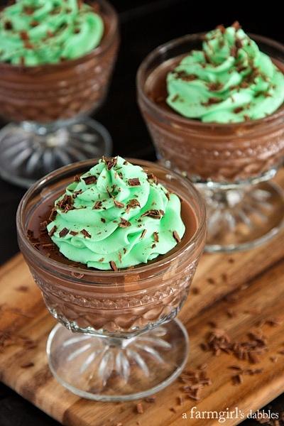 Homemade chocolate pudding cups with mint grasshopper cream