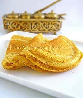 Malaysian apom balik pancake with peanuts and sweetcorn