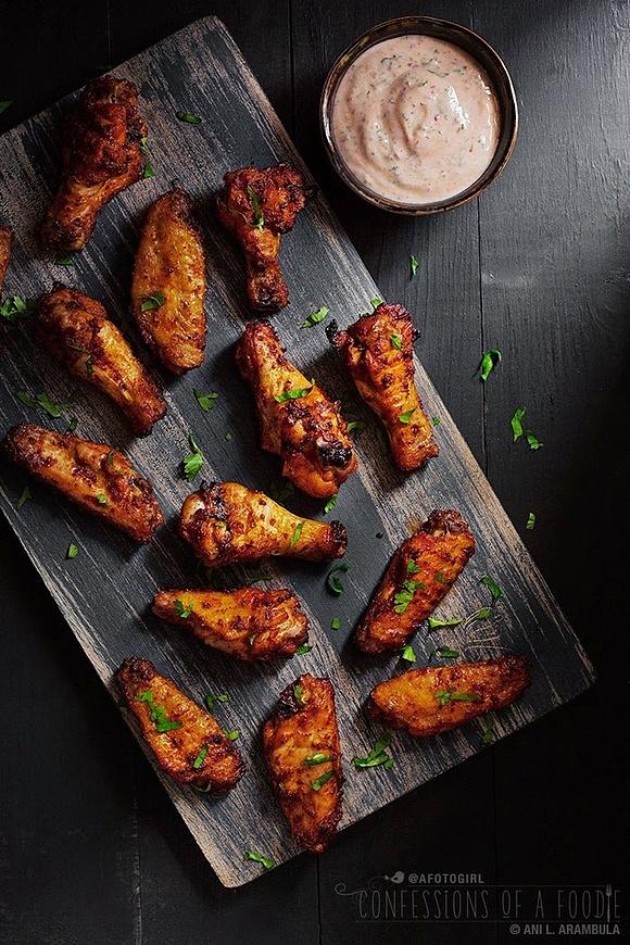 Harissa chicken wings with herbed yogurt dipping sauce