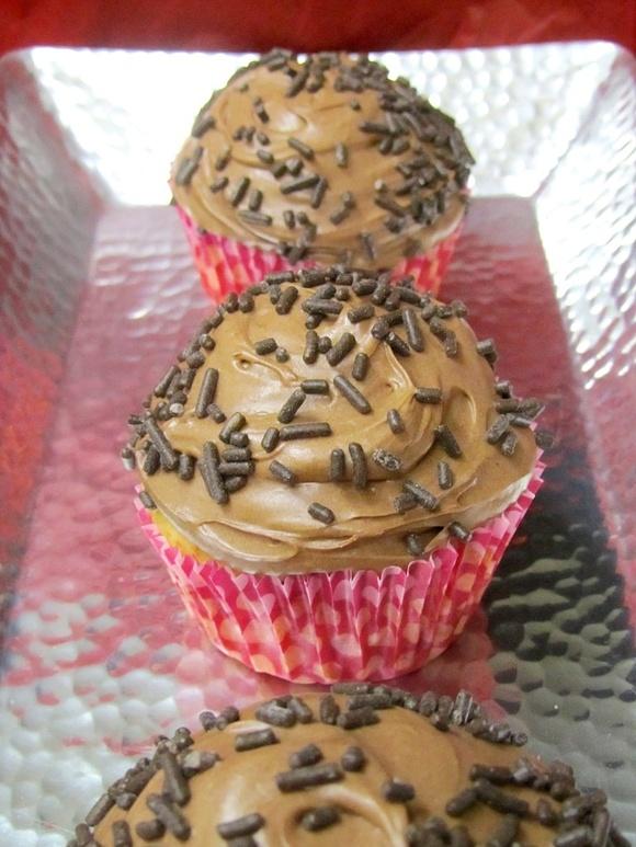 Fresh strawberry cupcakes with chocolate cheesecake frosting