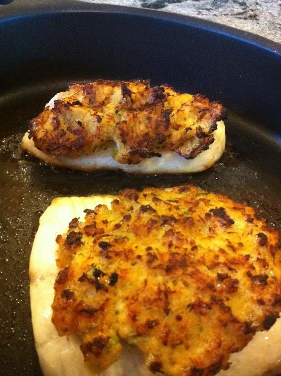 Tilapia garnished with lemon wedge