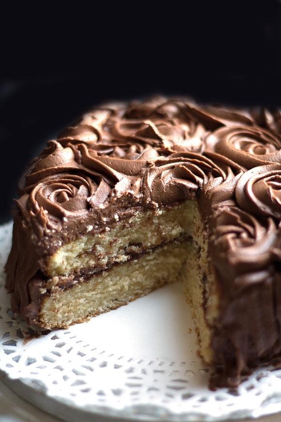Rich vanilla cake with chocolate fudge icing