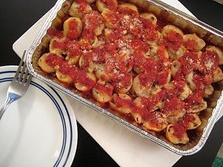 Stuffed shells in wine tomato sauce