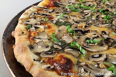 Spinach mushroom and basil pizza