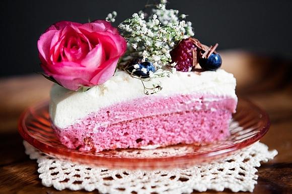 Layered raspberry and white chocolate mousse cake