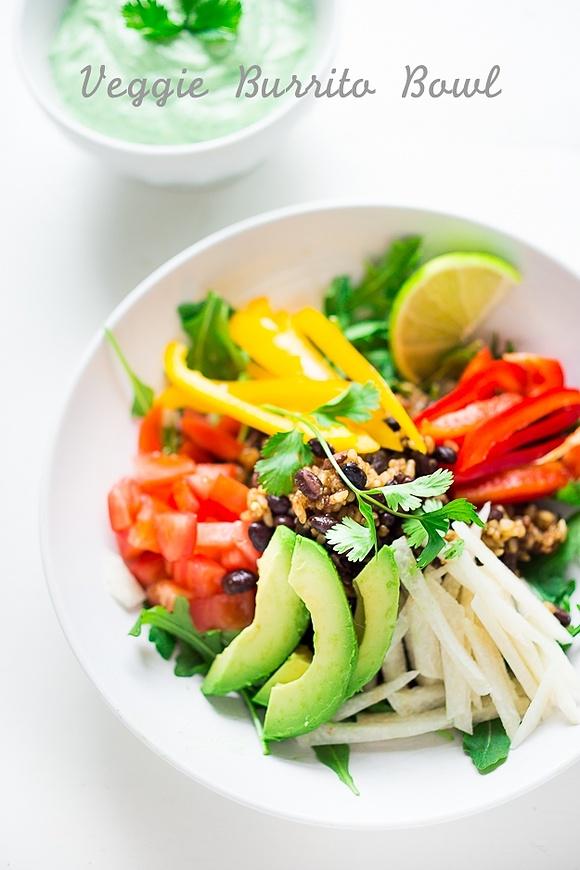 Veggie burrito bowl with creamy cilantro sauce