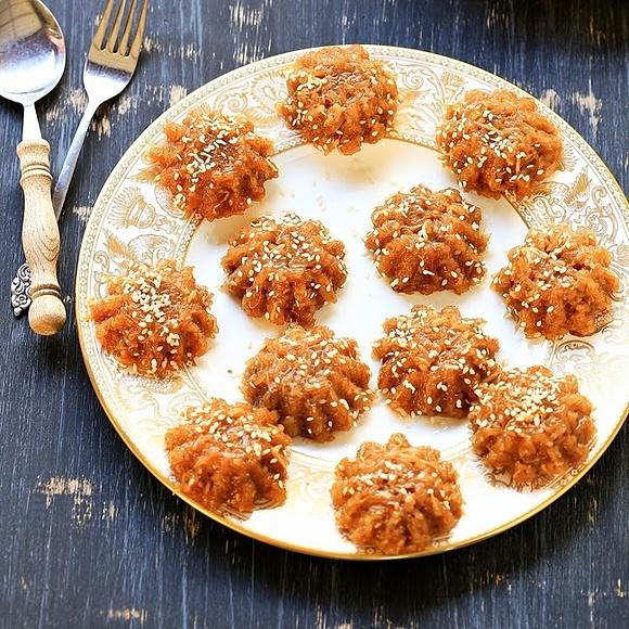 Kuih wajid with grated coconut and sesame seeds