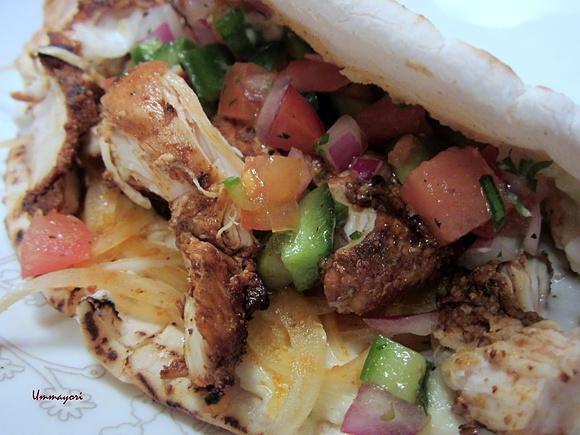 Chicken shawarma with tomato and cucumber relish