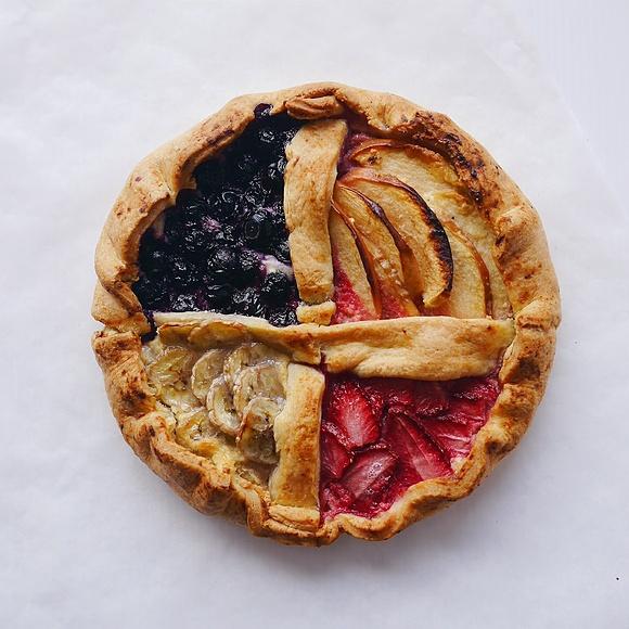 Fruit galette with berries, apples, bananas and caramel cream cheese