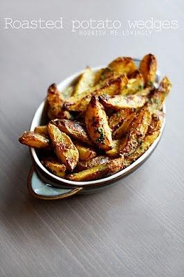 Oven-roasted seasoned potato wedges with parsley and Parmesan