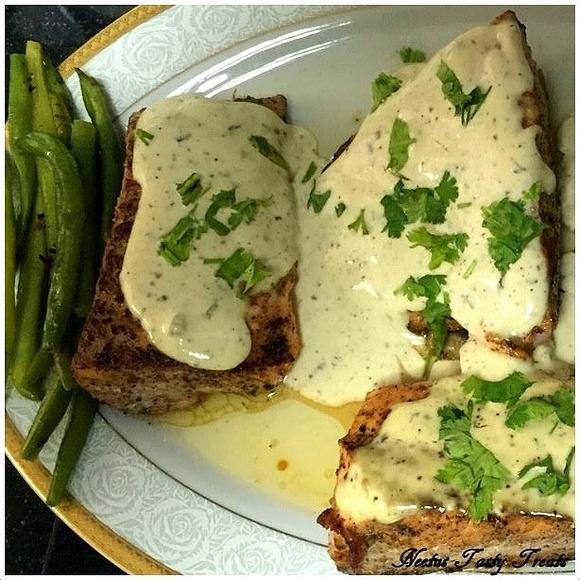 Fried salmon with lemon-infused cream sauce