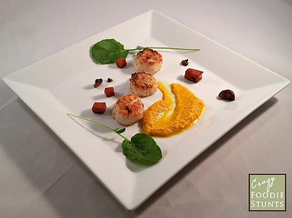 Pan-seared sea scallops with carrot purée, sautéed ham and mushrooms