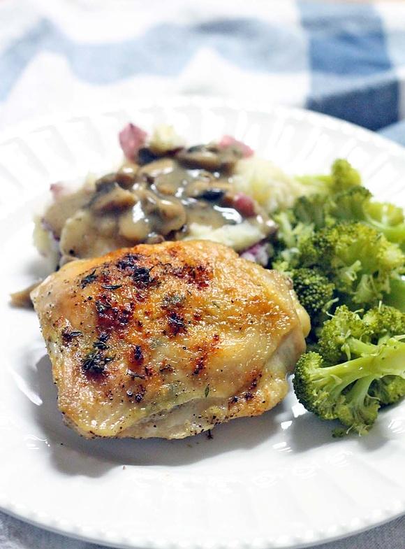 Crispy Oven Roasted Chicken Thighs with Lemon, Butter, and Thyme