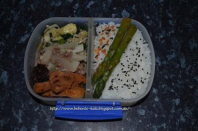 Bento a48 with rice, asparagus, baby corn, enoki mushrooms, daikon, pork fillet, and chili oil