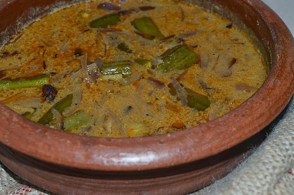 Okra in coconut milk curry with potatoes - kerala style