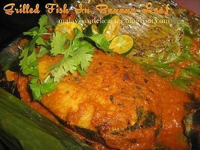 Grilled fish in banana leaf