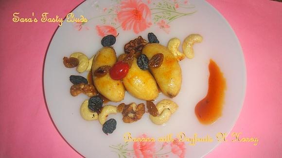 Banana with dry fruits and honey