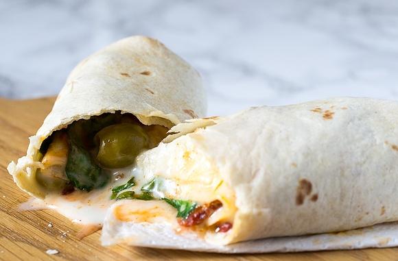 Air fried vegan spicy cream cheese and sundried tomato wrap