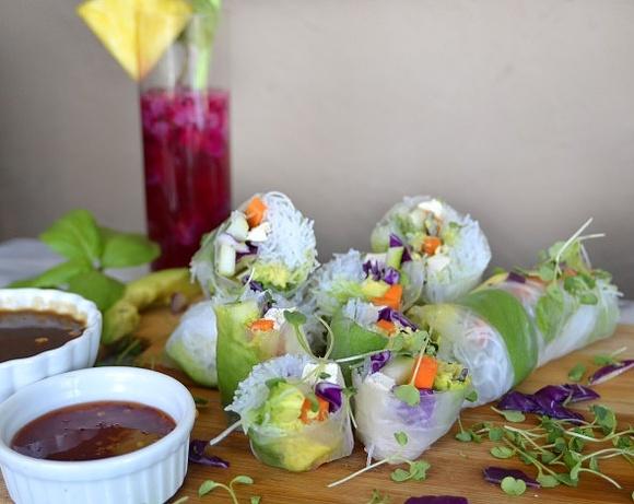 Vegan vietnamese fresh salad rolls with homemade peanut dipping sauce