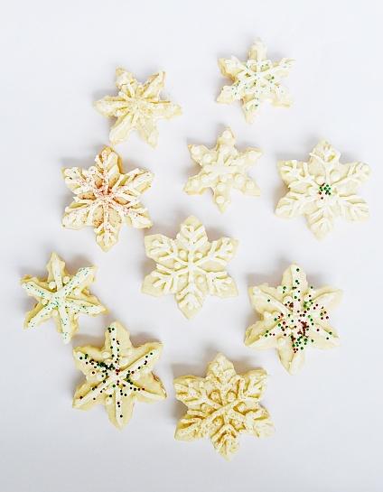 Snowflake sandwich cookies with maple buttercream filling
