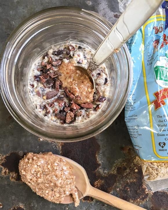 Overnight refrigerator oats with almond butter and cacao nibs